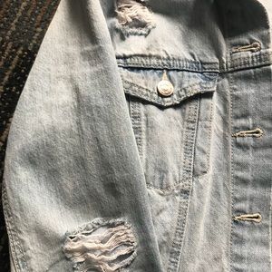 Distressed jean jacket
